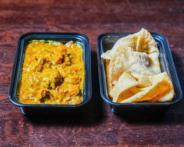 Curry Goat Roti.